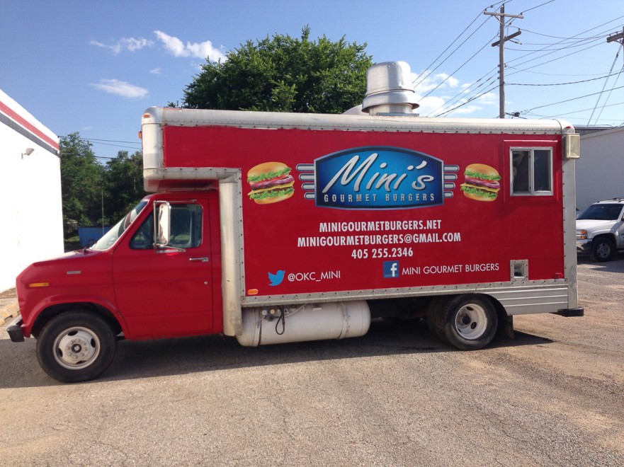 Custom wrap graphics on a red food truck