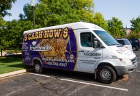 Sprinter Van with gold and purple wrap design